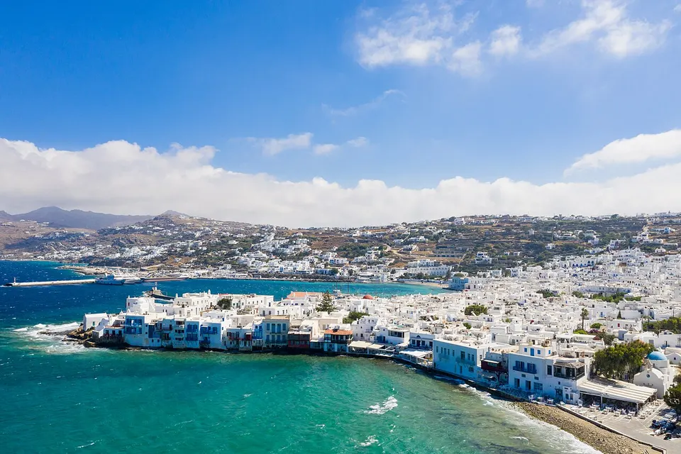 Mykonos: Little Venice with a view of the ferry terminal in Mykonos, Greece